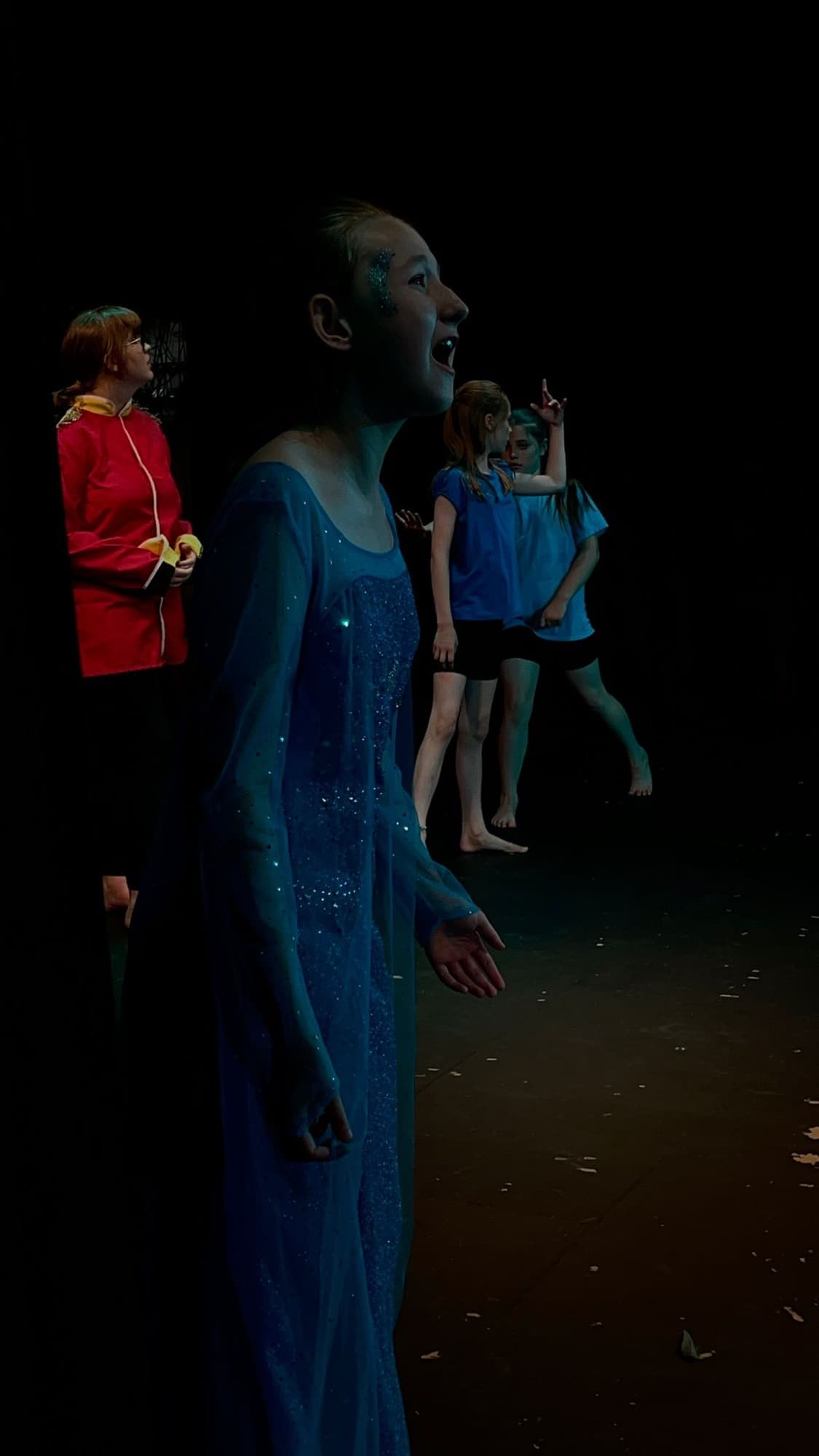 Dancers rehearsing in front of the studio mirrors