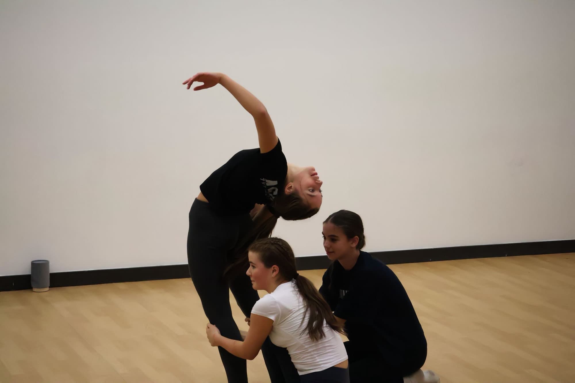 Amelia K Academy students in class and on stage