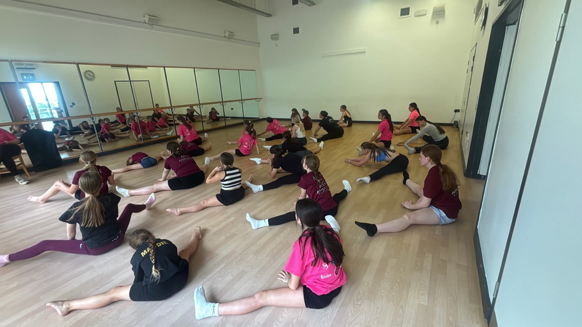 Amelia K Academy students in class and on stage